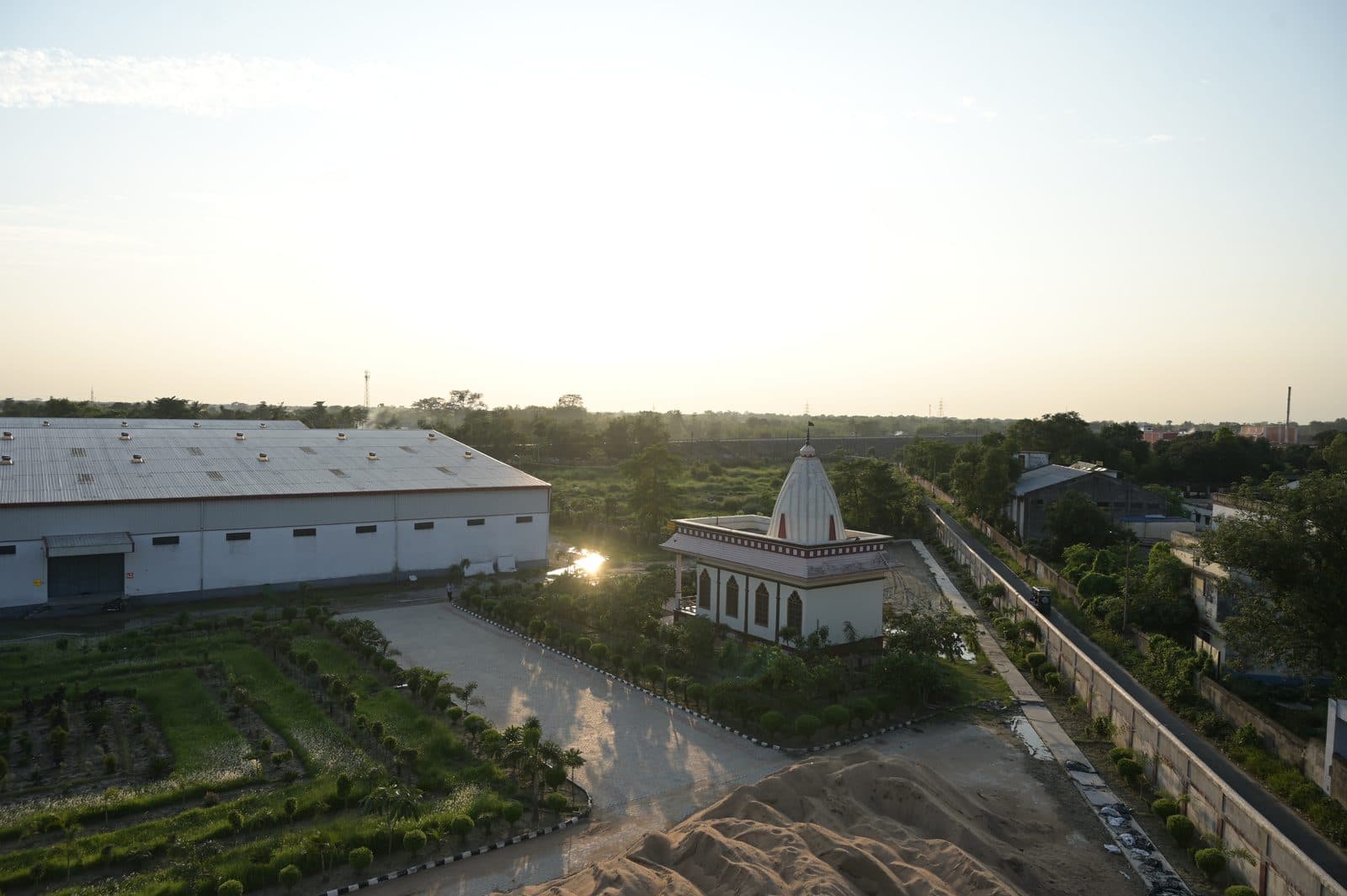Landscaped facility grounds at golden hour